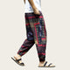 Person wearing colorful patterned pants.