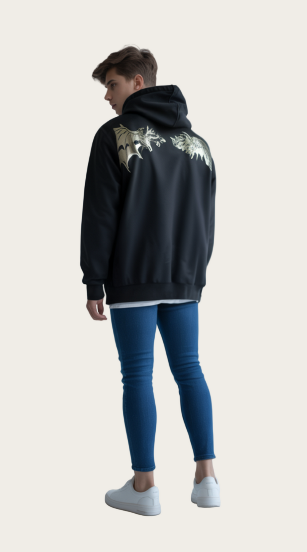 Person wearing a black hoodie with floral designs on the back, standing against a plain background