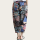 Colorful patterned pants worn by a person on a plain background