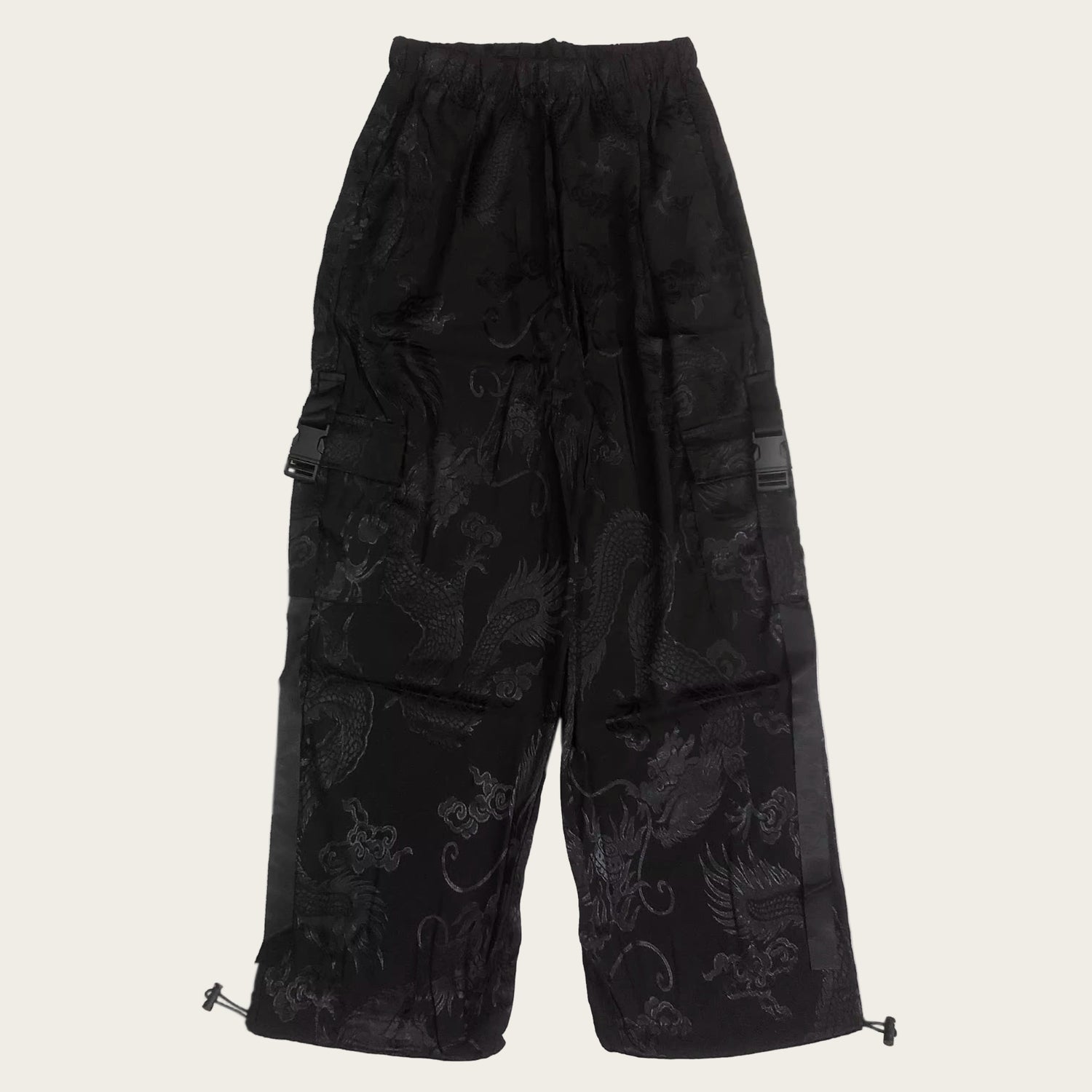 Black patterned pants on a white background