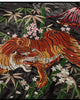 Close-up of the tiger among bamboo and pink blossoms under Mount Fuji