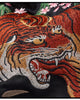 Close-up of the embroidered tiger's face and stripes