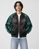 Model wearing the black and green tiger sukajan half zipped, front view