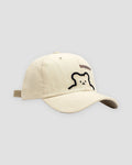 Cream bear outline embroidered baseball cap, three-quarter view