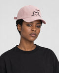 Model wearing the pink bear baseball cap, side view