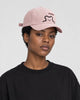 Model wearing the pink bear baseball cap, side view