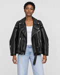 Model wearing the black PU leather biker jacket open, front view