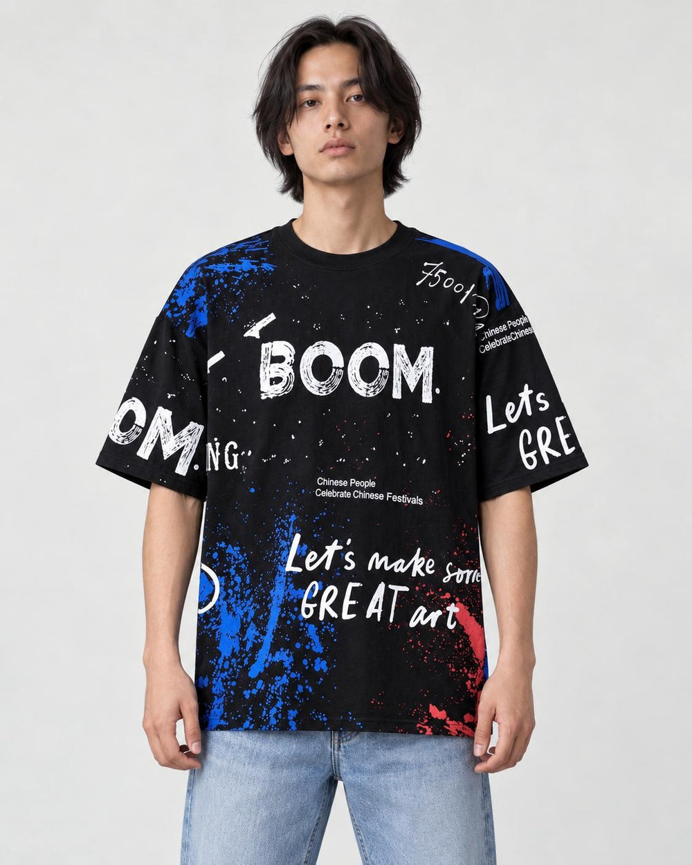Model wearing the black BOOM graffiti print T-shirt, front view
