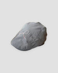 Gray flat cap with a fine pale pink bow embroidered on the crown