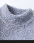 Close-up of the mock neck on the blue gray sweater