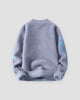 Blue gray fuzzy knit sweater, back view