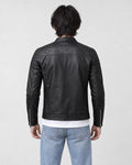 Model wearing the black PU leather jacket, back view