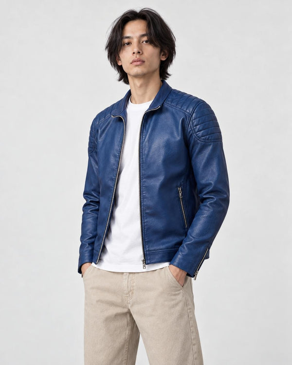 Model wearing the royal blue ridged shoulder jacket, three-quarter view