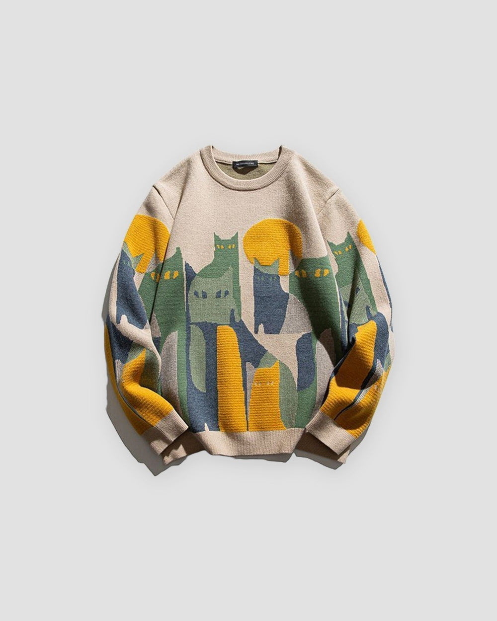 Beige knit sweater with cats under a yellow moon, front view