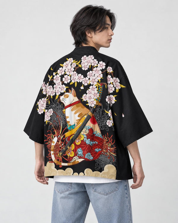 Man in the black haori seen from behind at an angle, with a calico cat, a katana and pink cherry blossoms on the back