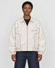 Model wearing the white PU leather jacket with contour piping, front view