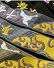 Close-up of the crane and golden cloud embroidery on the tapes