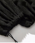 Close-up of the gathered drawcord ankle cuff