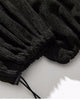 Close-up of the gathered drawcord ankle cuff