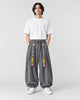 Model wearing the gray corduroy wide-leg pants, front view