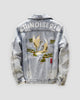 Light-wash denim jacket, back view, CHINOISERIE lettering above an embroidered crane