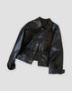Black cropped PU leather jacket with flap pockets and gold snaps, front view