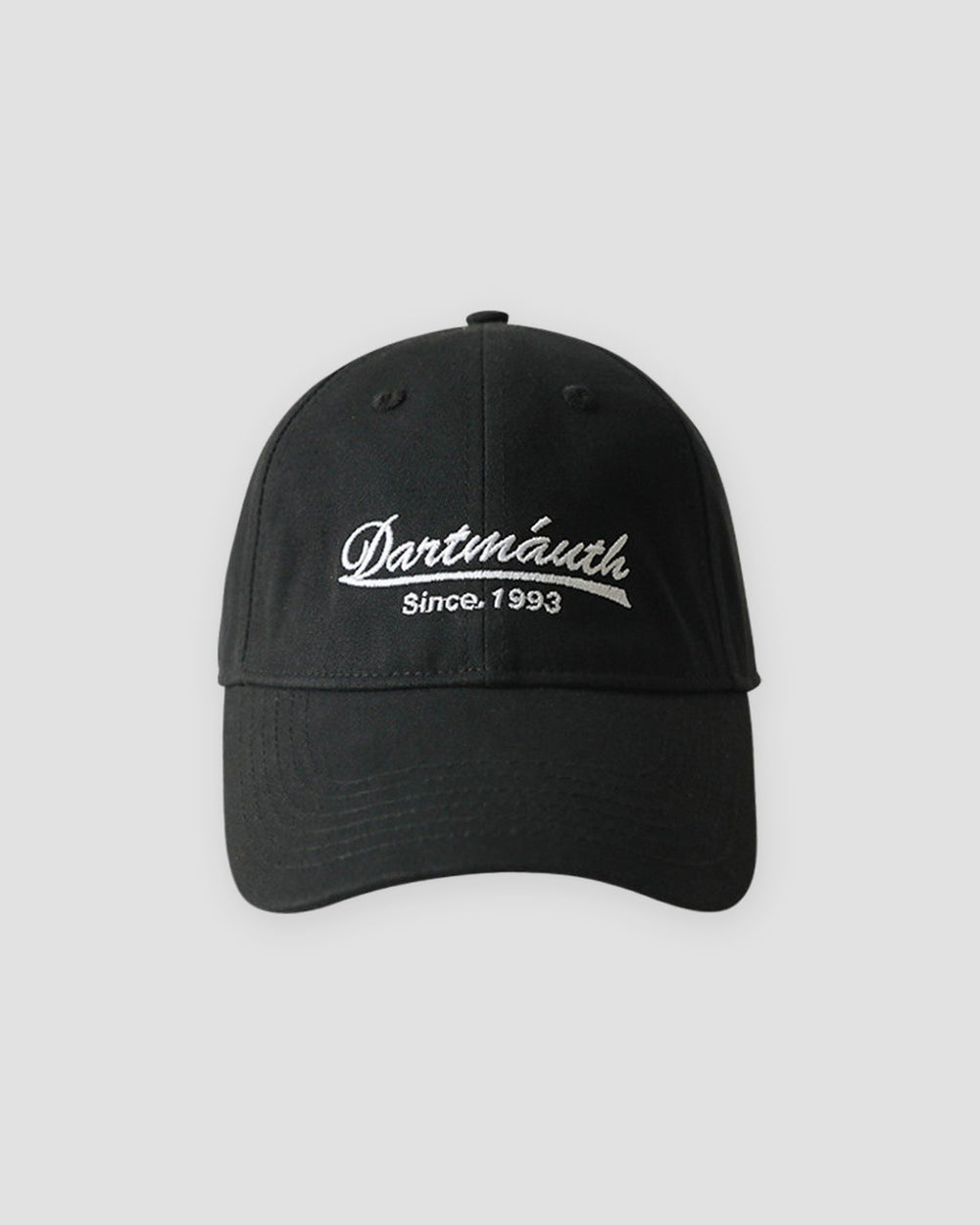 Black dad cap with white cursive script embroidery, front view