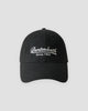 Black dad cap with white cursive script embroidery, front view
