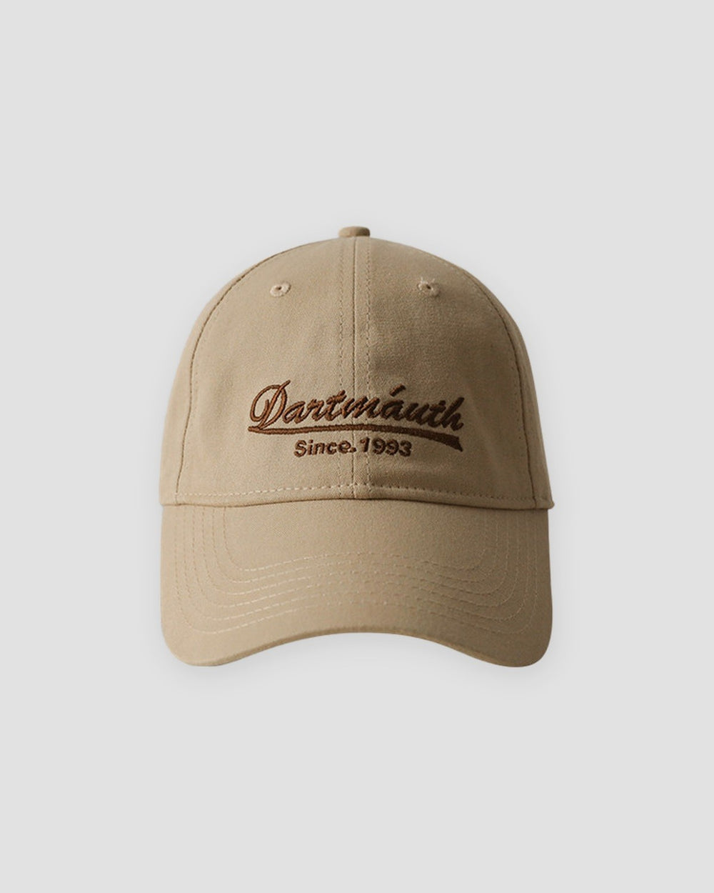 Khaki dad cap with brown cursive script embroidery, front view
