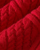Close-up of the red diamond cable knit