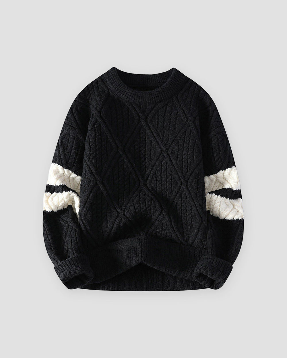 Black diamond cable knit sweater with cream sleeve stripes