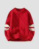 Red diamond cable knit sweater with cream stripes on the sleeves