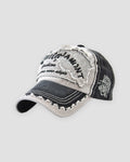 Black distressed patch baseball cap, three-quarter view, frayed stone patch with script lettering
