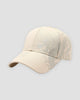Beige baseball cap with a taupe dragon printed across the side and calligraphy on the brim