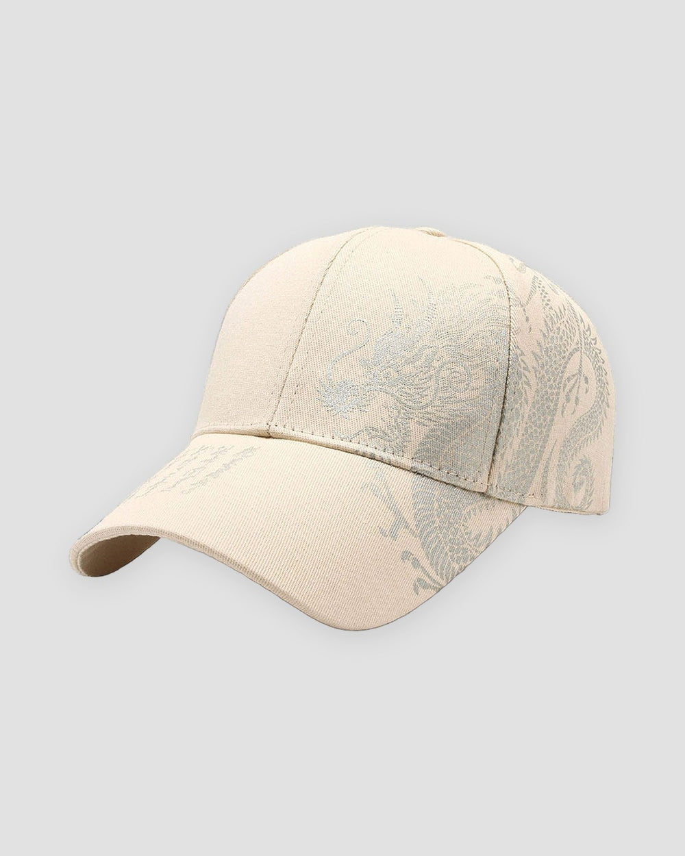 Beige dragon embroidered baseball cap, front view, pale dragon embroidery along the crown