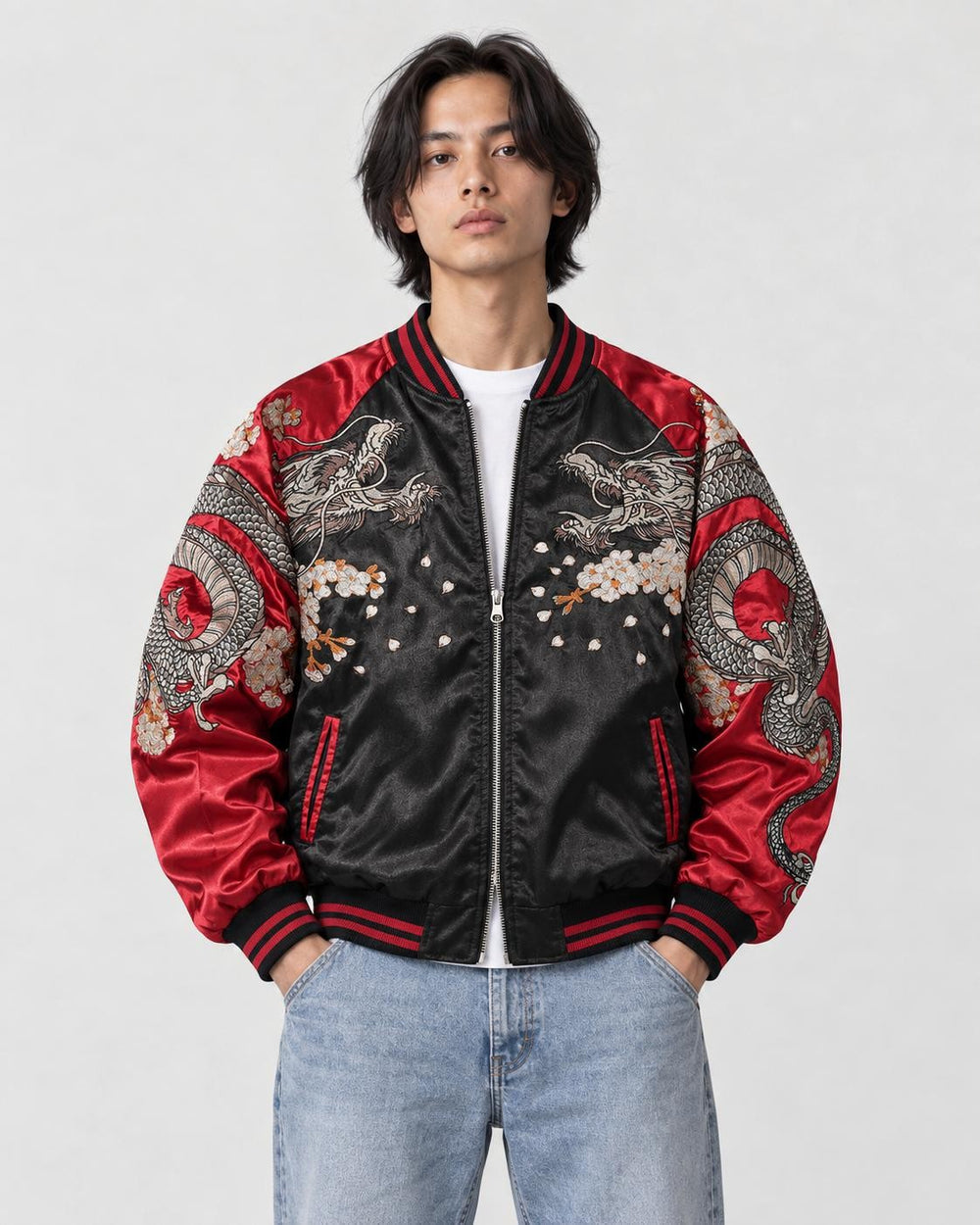 Model wearing the black and red dragon bomber half zipped, front view