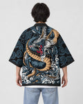 Man seen from behind in the black haori with a scaled blue-gray dragon and white waves across the back, over a white tee