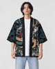 Man in the open black dragon haori with a white tee and light jeans, the dragon and clouds across the front panels