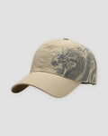 Beige baseball cap with a gray dragon print