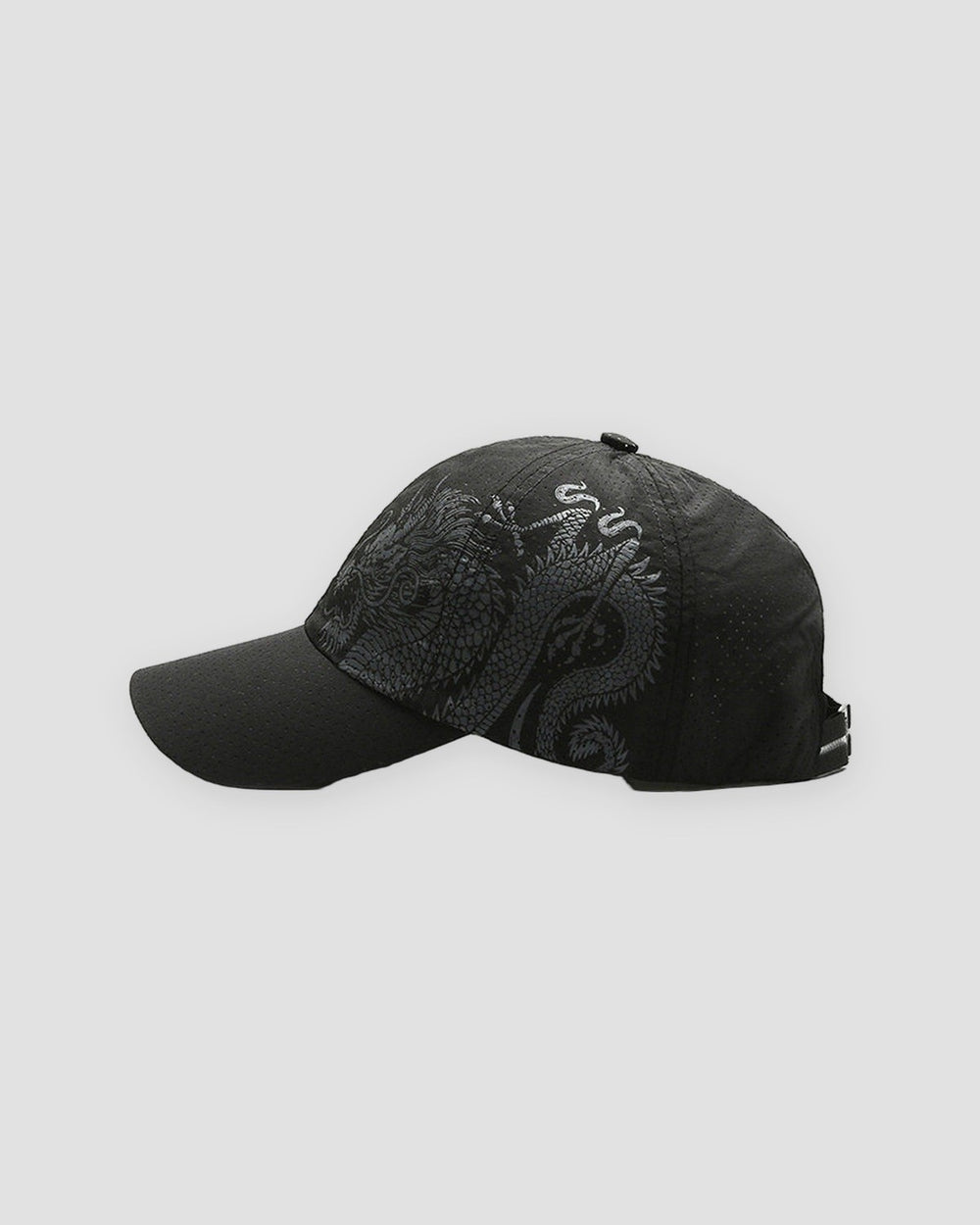Black dragon print cap, side view of the dragon body