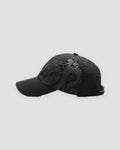 Black dragon print cap, side view of the dragon body
