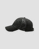Black dragon print cap, side view of the dragon body