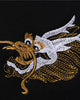Close-up of the small gold and white dragon head embroidered on the chest
