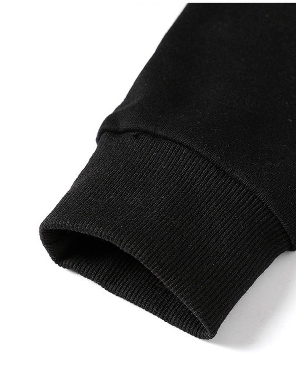 Close-up of the ribbed cuff on the embroidered sleeve