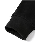 Close-up of the ribbed cuff on the embroidered sleeve