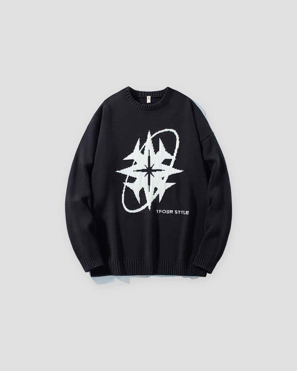 Black knit sweater with a large off-white eight-point star and ring