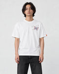 Model wearing the white T-shirt with a small butterfly on the left chest, front view