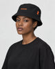 Model wearing the PARANOID bucket hat, three-quarter view