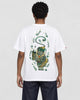Model wearing the white pixiu embroidered T-shirt with dark jeans, back view