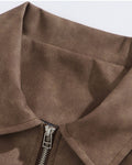 Close-up of the brown faux suede collar and zip